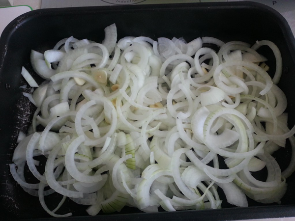 Contramuslos de pollo encebollado Contramuslos de pollo encebollado
